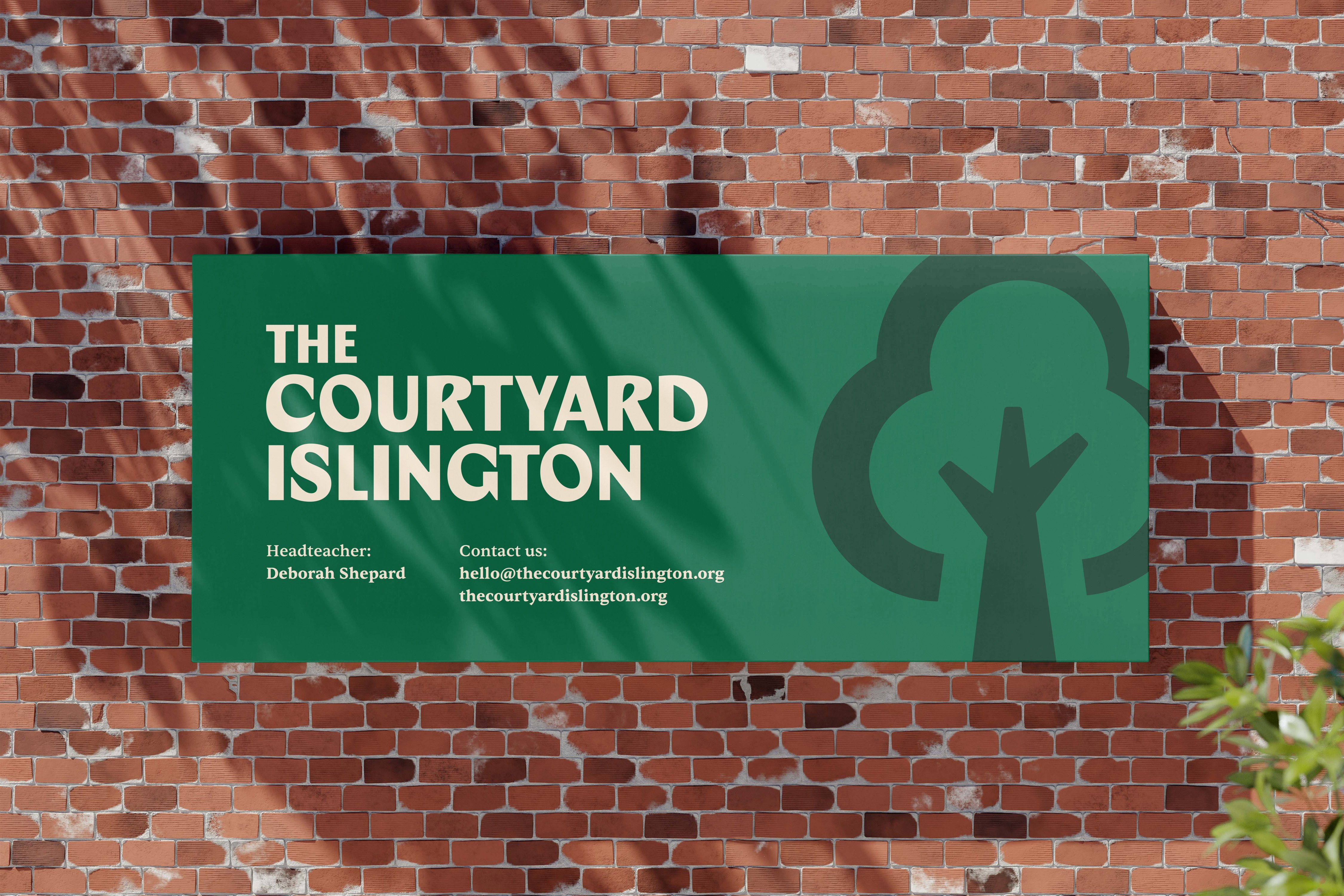 Courtyard Islington logo in a wall