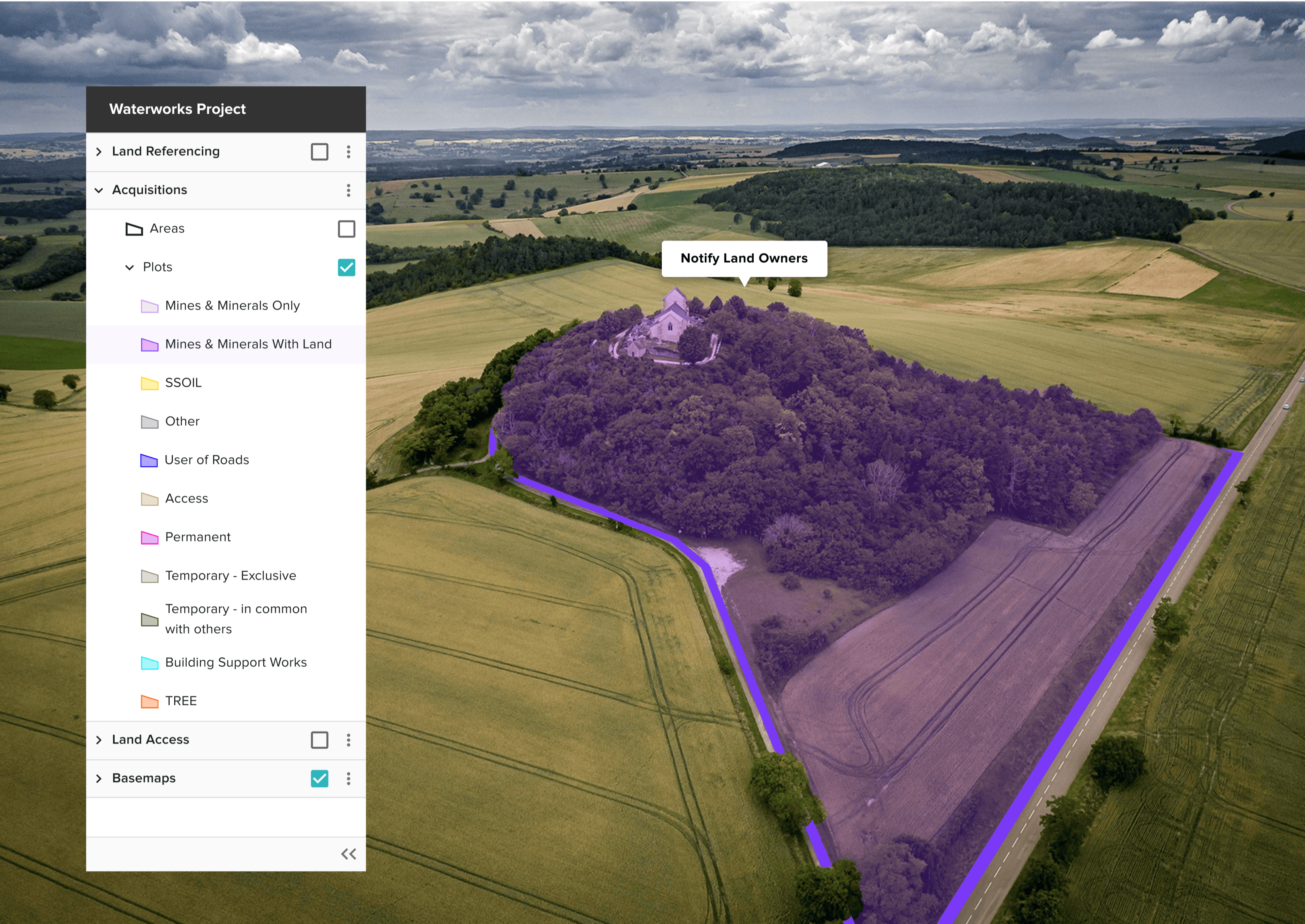 View from above of a land with project details on one side of it